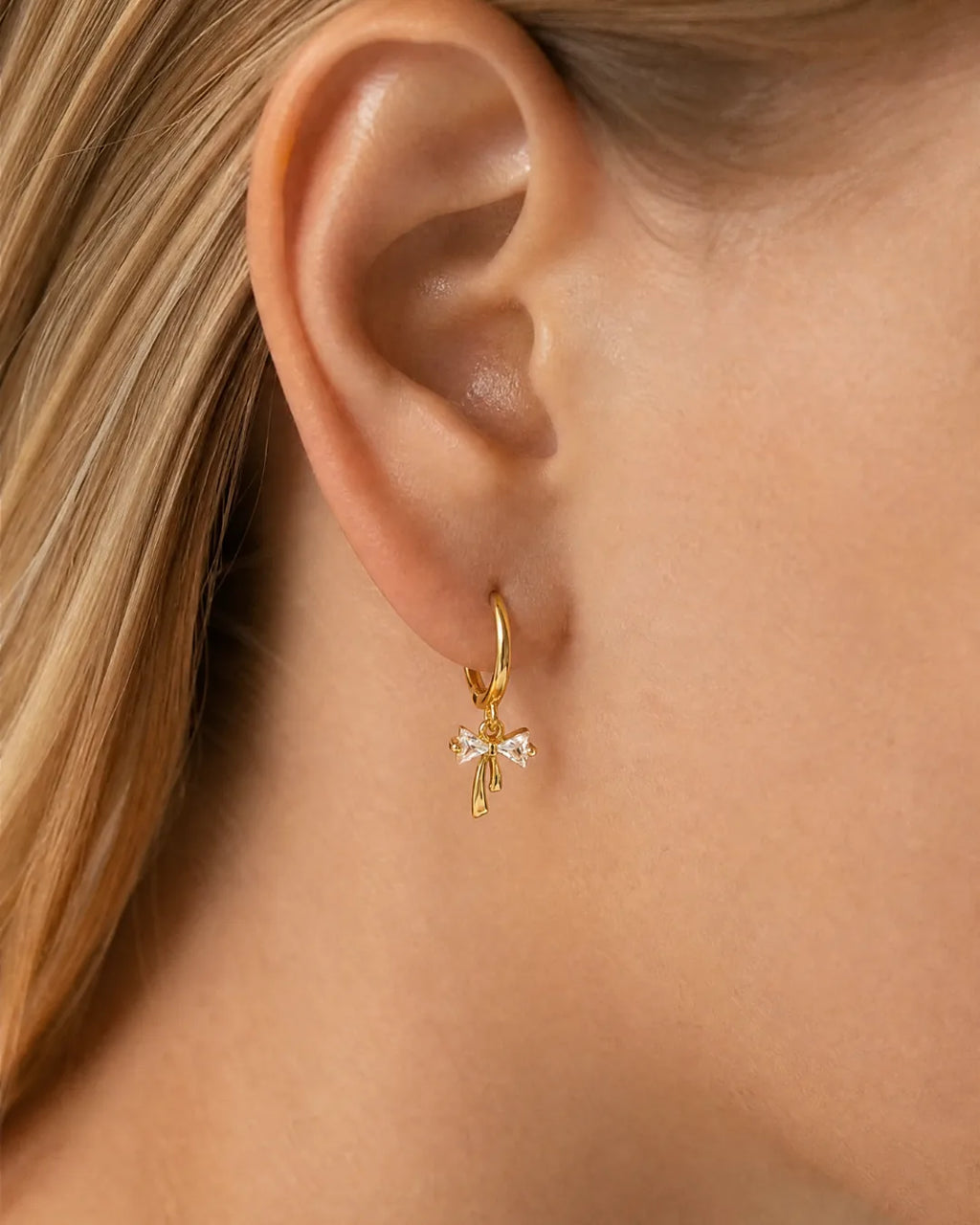 Celina Bow Huggie Earrings Lavish