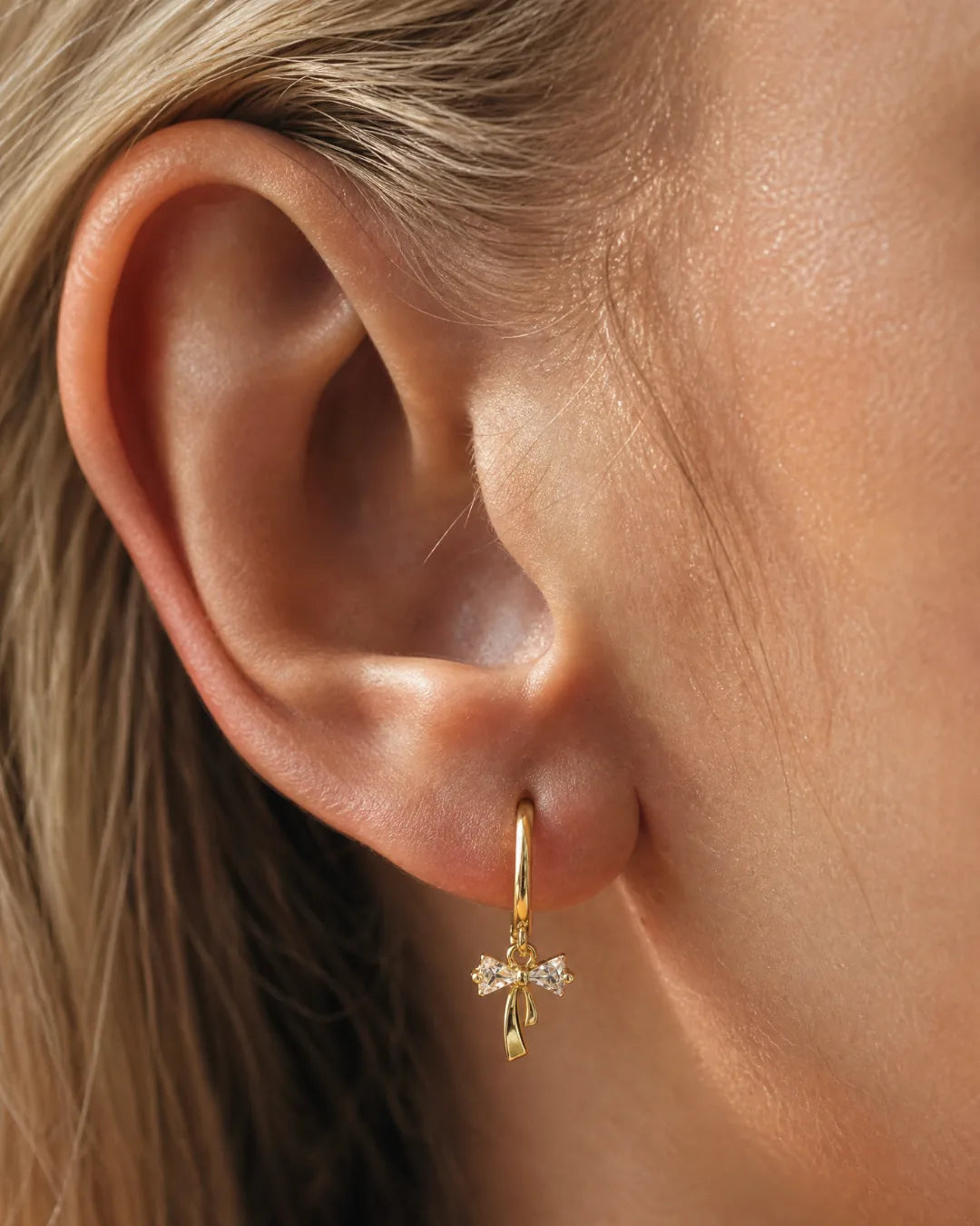 Celina Bow Huggie Earrings Lavish
