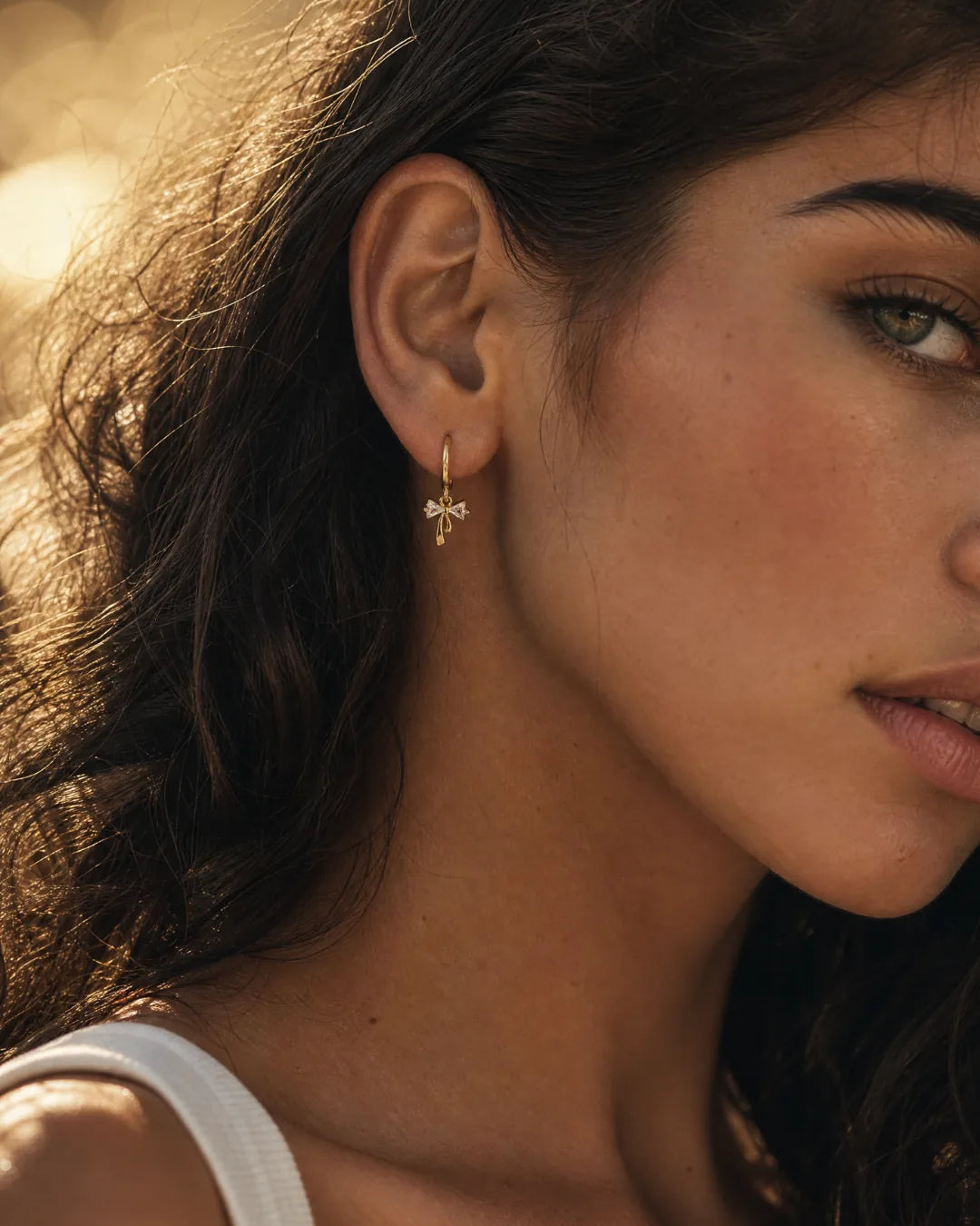 Celina Bow Huggie Earrings Lavish