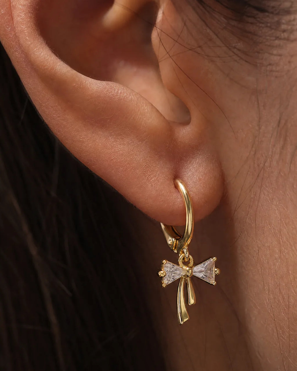 Celina Bow Huggie Earrings Lavish